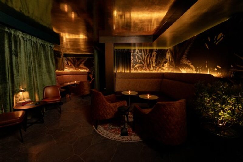 Honolulu speakeasy-style bar with island-inspired decor and intimate ambiance