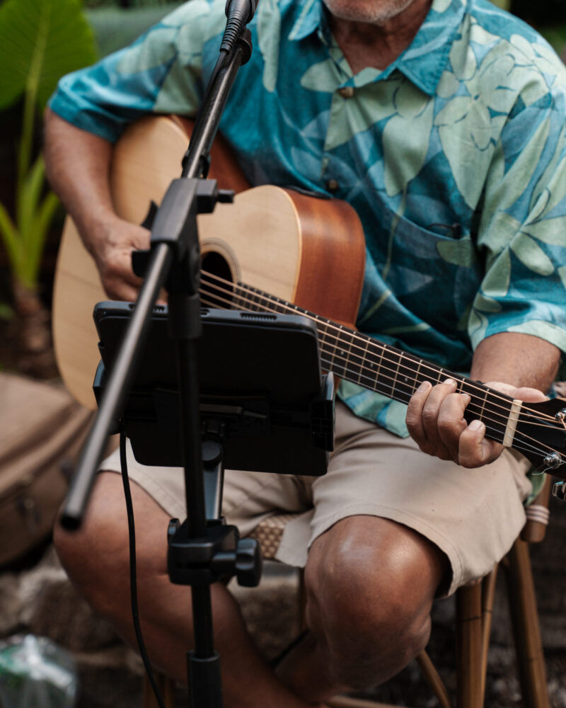 Close up photo of guitarist at Heyday
